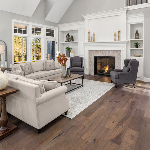 Vinyl flooring near fireplace | Carpet Plus